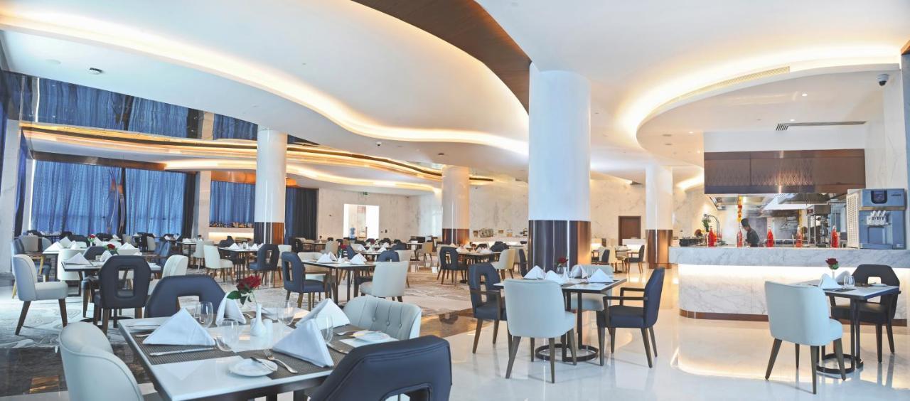 Royal M Al Aqah Beach Resort By Gewan Bagian luar foto The restaurant