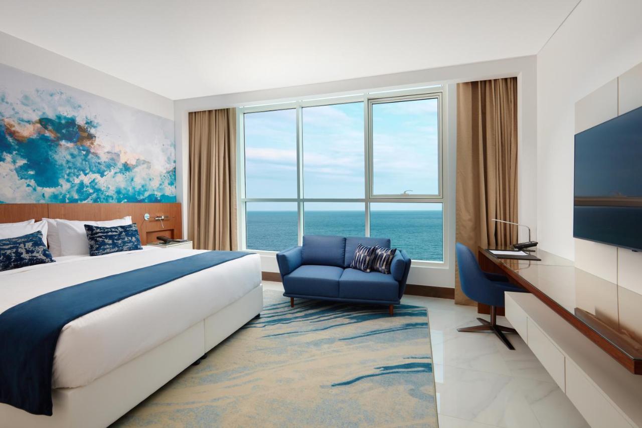 Royal M Al Aqah Beach Resort By Gewan Bagian luar foto Deluxe Room