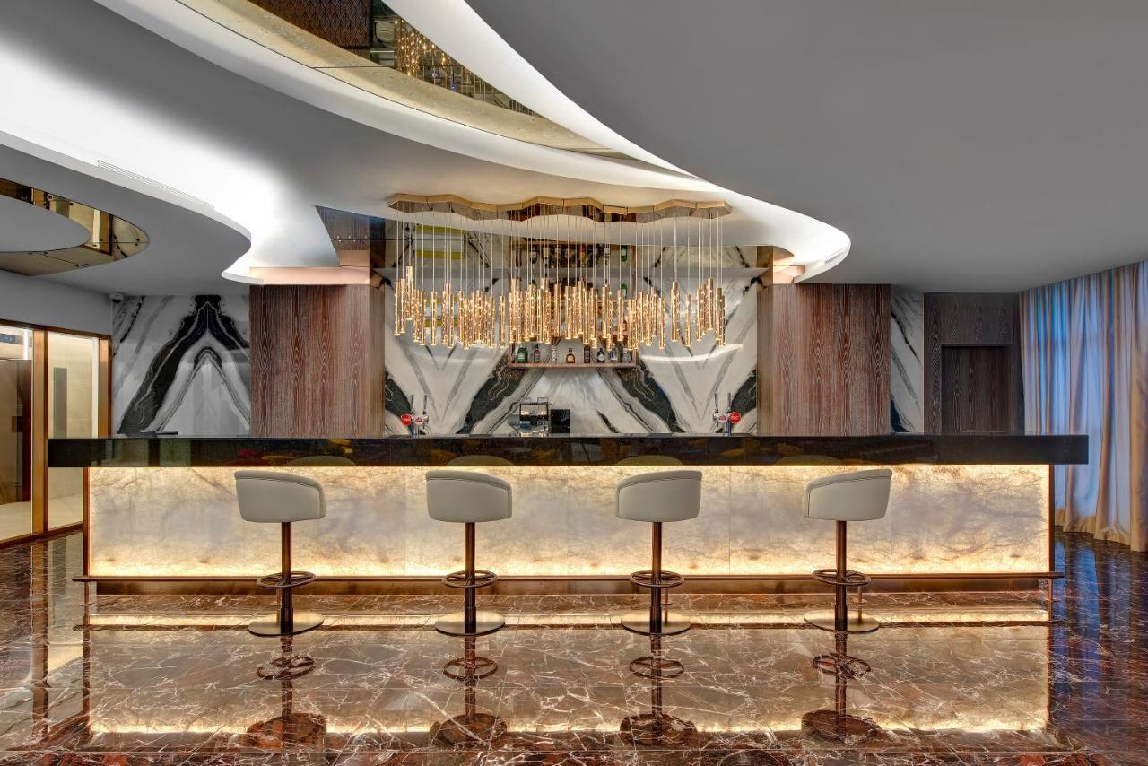 Royal M Al Aqah Beach Resort By Gewan Bagian luar foto The bar at the 101 lounge