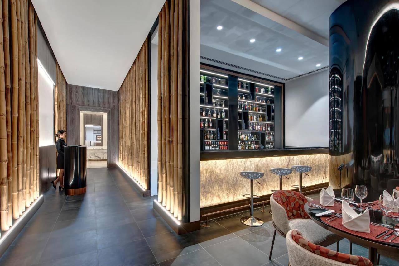 Royal M Al Aqah Beach Resort By Gewan Bagian luar foto The bar at the restaurant