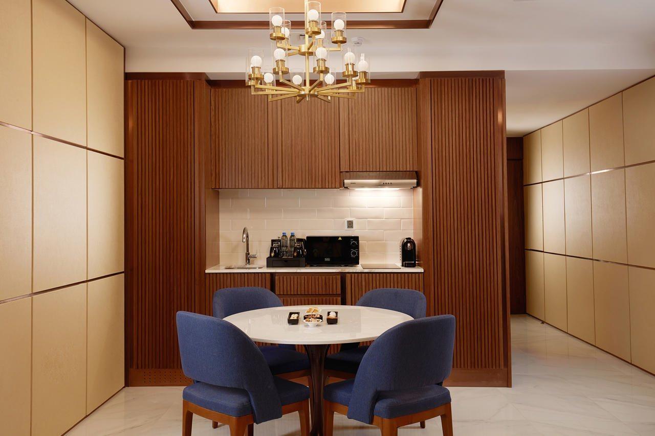 Royal M Al Aqah Beach Resort By Gewan Bagian luar foto A kitchen in a suite at The Ritz-Carlton, Tokyo
