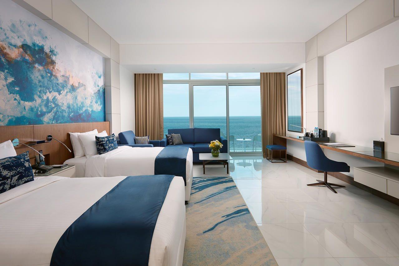 Royal M Al Aqah Beach Resort By Gewan Bagian luar foto Deluxe Ocean View Room